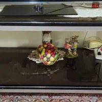 مبل تکی  و میز شیشه ای قاب آلومینیومی