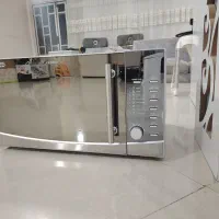 ماکروویو دلونگی درحد نو