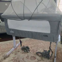 تخت کودک کنار مادر