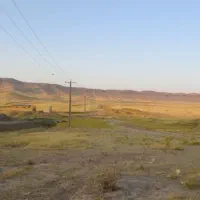 زمین ۱۰۰۰متری لب خیابان یکم بالاتر از کارخانه آرد