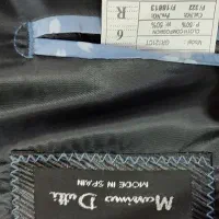 کت و شلوار|لباس|قم, باغ کرباسی|دیوار