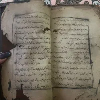 کتاب قدیمی خطی و سنگی با قدمت بالا