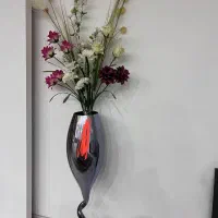 گلدان با گل مصنوعی