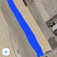 زمین بر روستای اسد خانی کنار جاده