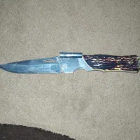 چاقوی قدیمی و ساعت کتیزن