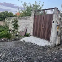 زمین ۲۱۵ متری همراه با خانه