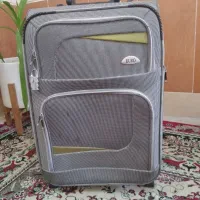چمدان مسافرتی متوسط طوسی درحد نو