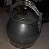 زود پز|ظروف پخت‌وپز|شیراز, کوشک میدان|دیوار
