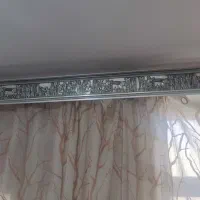 چوب پرده و کتیبه