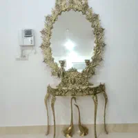 ست میزتلوزیون و اینه شمعدون و گنجه