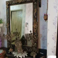 اینه کنسول سالم وزیبا همراه۲شمعدان ویک ساعت دکوری