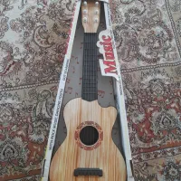 فروش گیتار کودک درحدنو رودسر مدل 890 Music