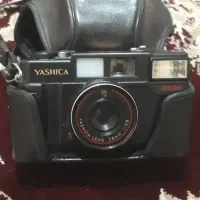 دوربین یوشیکا اصلی. باکاورچرمی فابریک خودش