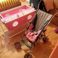 گهواره کودک و کالسکه سفری