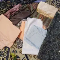 مقداری پارچه نبریده سالم وتمیز۲۰ تکه پولک