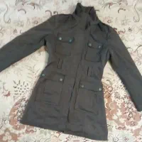 پوشاک|لباس|رباط‌کریم, کیکاور|دیوار