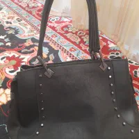 کیف دوشی دستی