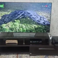 تلوزیون ال جی OLED ۵۵ اینچ و میز تلوزیون