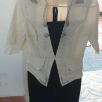 تعدادی بلیز،دامن و لباس مجلسی|لباس|صحنه, |دیوار