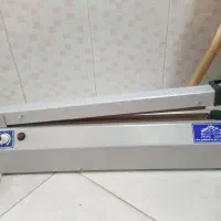 دستگاه پرس پلاستیک تایمردار تک دوخت صنعتی مانا