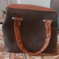 کیف دوشی|کیف، کفش، کمربند|قم, تعویض پلاک|دیوار