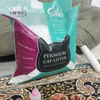 خاک گربه استفاده نشده و شیشه شیر مخصوص بچه گربه