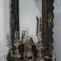 اینه .کنسول همراه با شمعدونی وساعت