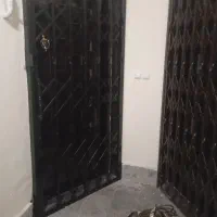 درب ریلی.تعمیرات اکاردیونی ومحافظ تراس  بالکن ونرد