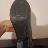 پوتین ساق دار|کیف، کفش، کمربند|ری, شهید غیوری (ابن باویه)|دیوار