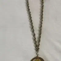 گردبند شیر خورشید|کلکسیون اشیاء عتیقه|گرگان, |دیوار