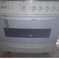 اجاق گاز ۵ شعله تاکنوگاز فر دار با جوجه گردان