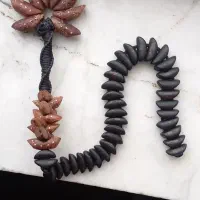 تسبیح خرما زندان بافت سر تسبیح مس کوب