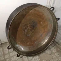 یک عدد دیگ و یک عدد قلفچه و یک عدد مجمه مسی قدیمی