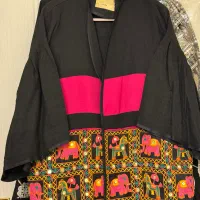 مانتو کتی|لباس|ری, سرتخت|دیوار