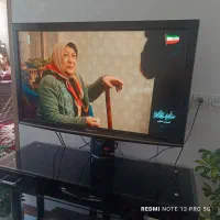 تلویزیون ومیز تلویزیون