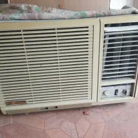 کولر پنجره ای پیستونی