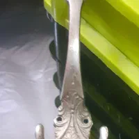 جا لباسی برنجی