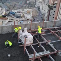 اجرای کفسازی و شیب بندی با دستگاه اسکرید (پوکه)