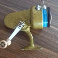 چوب وقلاب و چرخ ماهیگیری