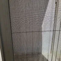 یک عدد درب توری پلیسه .
