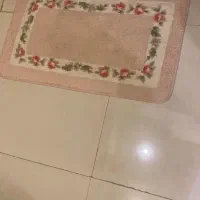 یک جفت پادری صورتی و فرش ماکادون