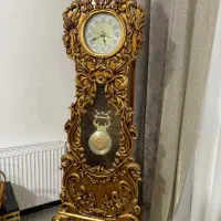 ساعت ایستاده و قاب عکس