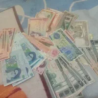 اسکناس نو تا نخورده ب همراه ۱۰۰عدد سکه نوستالژی