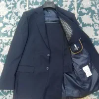 یک دست کت وشلوارویه جفت کفش نو