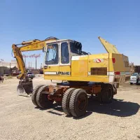بیل‌مکانیکی۹۱۲‌چرخ‌لاستیکی