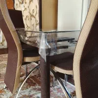 میز ناهارخوری چهار نفره جنس استیل رویه چرم حصیری