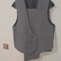 یک دست کت شلوار نو