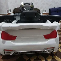 ماشین شارژی کنترل دار .دو در باز میشه.فلش خور