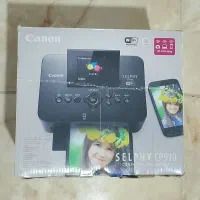پرینتر چاپ عکس Canon با یه بسته کارتریج نو اضافه