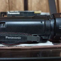 دوربین فیلمبرداری و عکاسی فورکی پاناسونیکwx970|دوربین عکاسی و فیلمبرداری|شیراز, شاهچراغ|دیوار